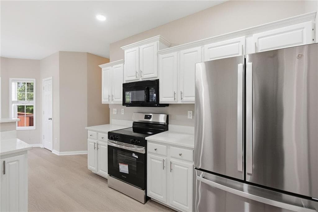 5 bedroom, 4 bathroom, 3,395 sq ft single family residence for sale at 198 Wallace Hill Court, Lawrenceville, GA 30045 — photo 4