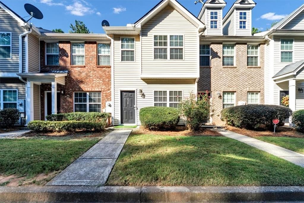 2 bedroom, 3 bathroom, 1,418 sq ft townhouse for sale at 434 Berckman Drive, Lilburn, GA 30047 — photo 1 of 21