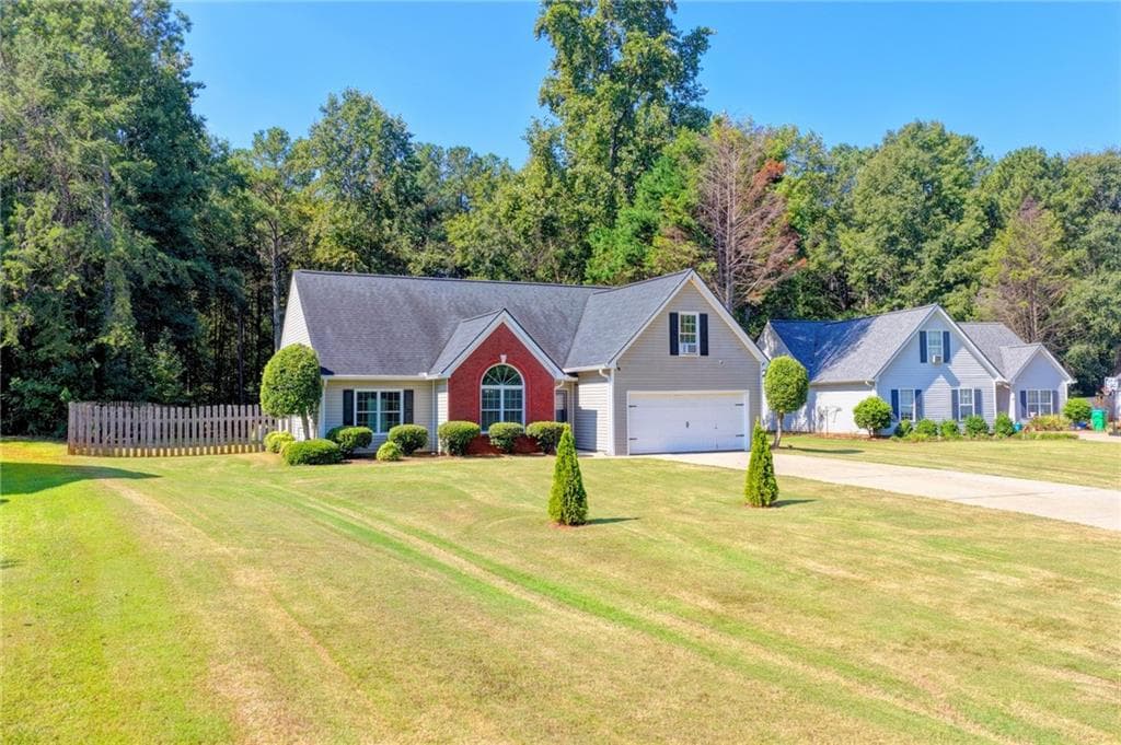 4 bedroom, 2 bathroom, 1,933 sq ft single family residence for sale at 5496 Amber Cove Way, Flowery Branch, GA 30542