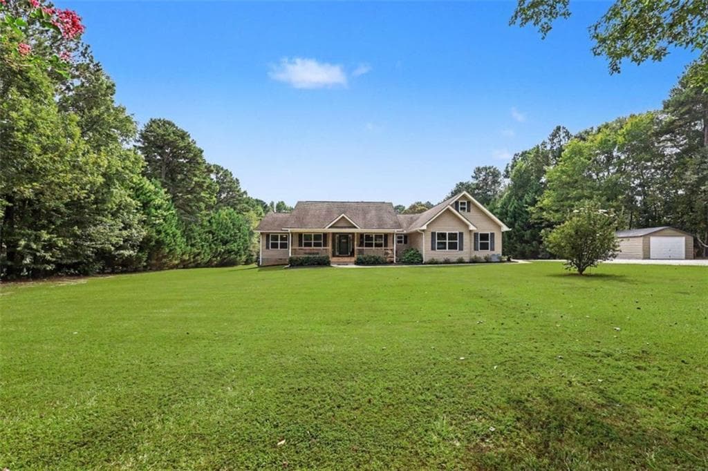 3 bedroom, 2 bathroom, 2,335 sq ft single family residence for sale at 4851 Holly Springs Road, Pendergrass, GA 30567 — photo 3