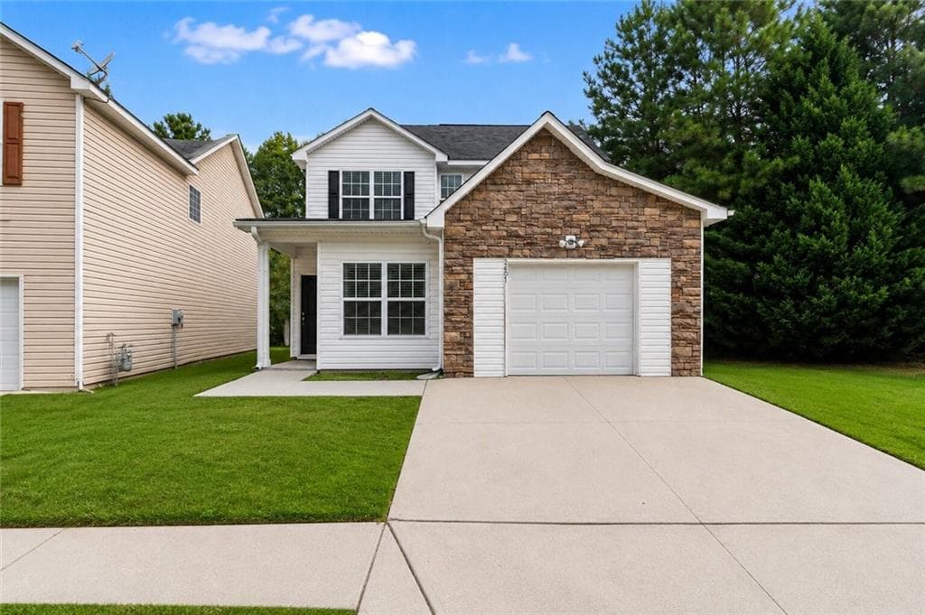 4 bedroom, 3 bathroom, 1,880 sq ft single family residence for sale at 2407 Hackamore Drive, South Fulton, GA 30349 — photo 2