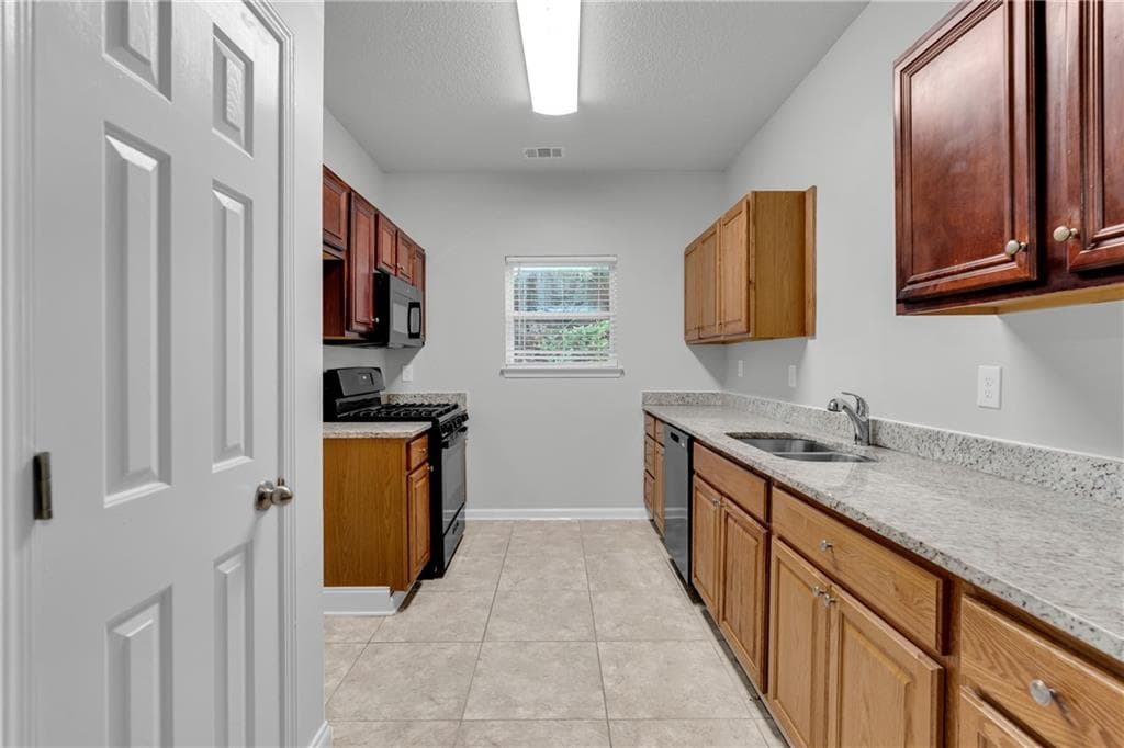 4 bedroom, 3 bathroom, 1,880 sq ft single family residence for sale at 2407 Hackamore Drive, South Fulton, GA 30349 — photo 9