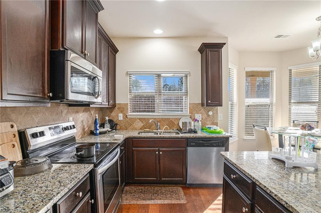 4 bedroom, 4 bathroom, 3,072 sq ft single family residence for sale at 2495 Brittany Park Lane, Ellenwood, GA 30294 — photo 6