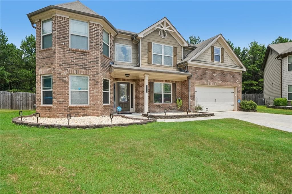 5 bedroom, 3 bathroom, 2,824 sq ft single family residence for sale at 1415 Union Station Court, Lawrenceville, GA 30045 — photo 2