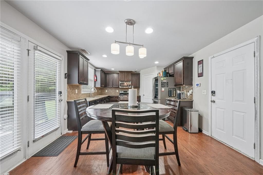 5 bedroom, 3 bathroom, 2,824 sq ft single family residence for sale at 1415 Union Station Court, Lawrenceville, GA 30045 — photo 9