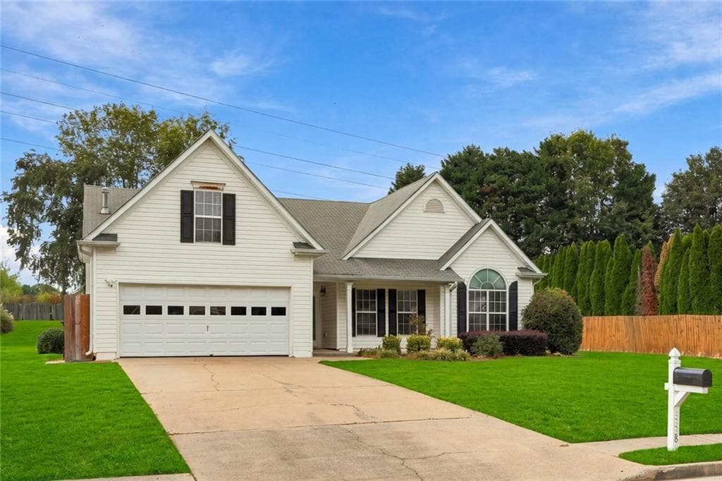 4 bedroom, 2 bathroom, 2,296 sq ft single family residence for sale at 3338 Woodtree Lane, Buford, GA 30519 — photo 2
