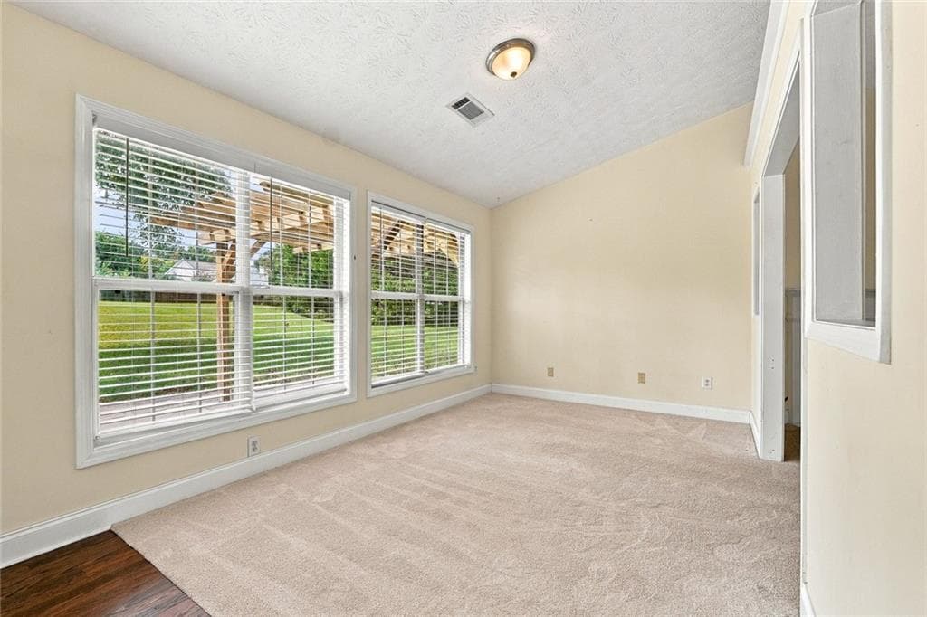 4 bedroom, 2 bathroom, 2,296 sq ft single family residence for sale at 3338 Woodtree Lane, Buford, GA 30519 — photo 9