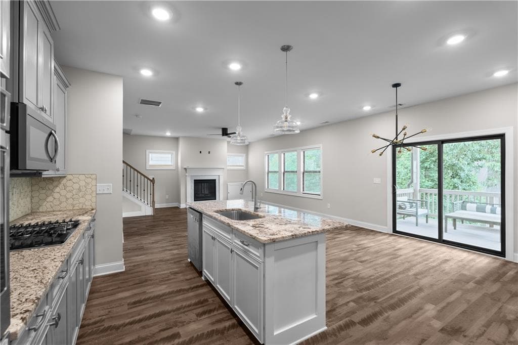 4 bedroom, 3 bathroom, 3,478 sq ft single family residence for sale at 5980 Arbor Green Circle, Sugar Hill, GA 30518 — photo 3