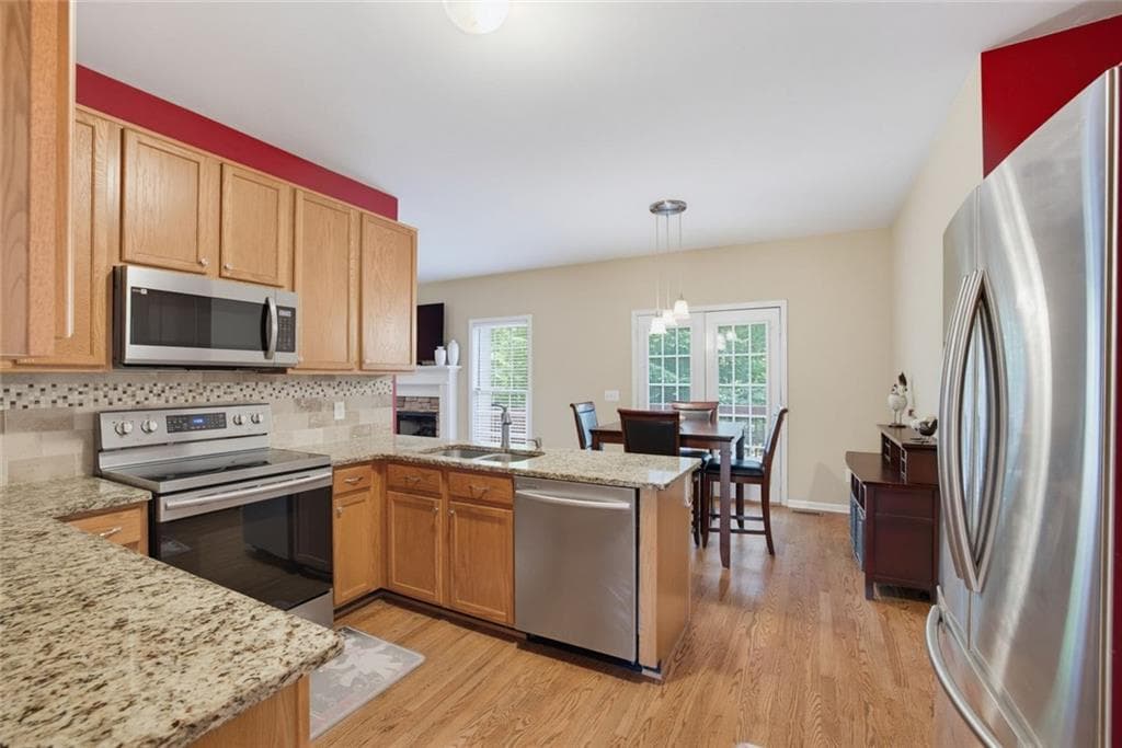 5 bedroom, 4 bathroom, 3,091 sq ft single family residence for sale at 211 Sweetbriar Lane, Canton, GA 30115 — photo 6