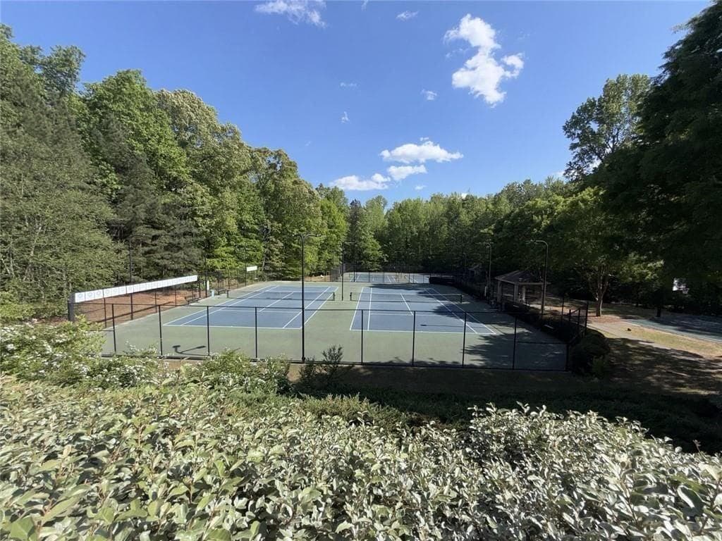 5 bedroom, 4 bathroom, 3,456 sq ft single family residence for sale at 4750 Heathcliff Way, Cumming, GA 30041 — photo 4