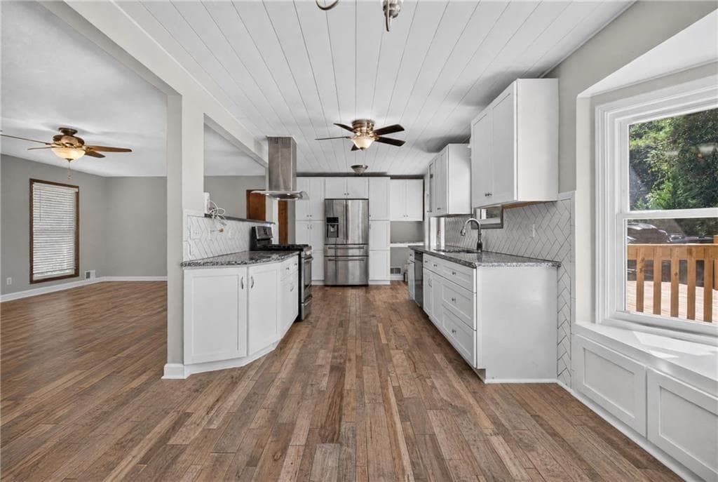 5 bedroom, 3 bathroom, 2,166 sq ft single family residence for sale at 5147 Dekalb Way, Stone Mountain, GA 30087 — photo 5