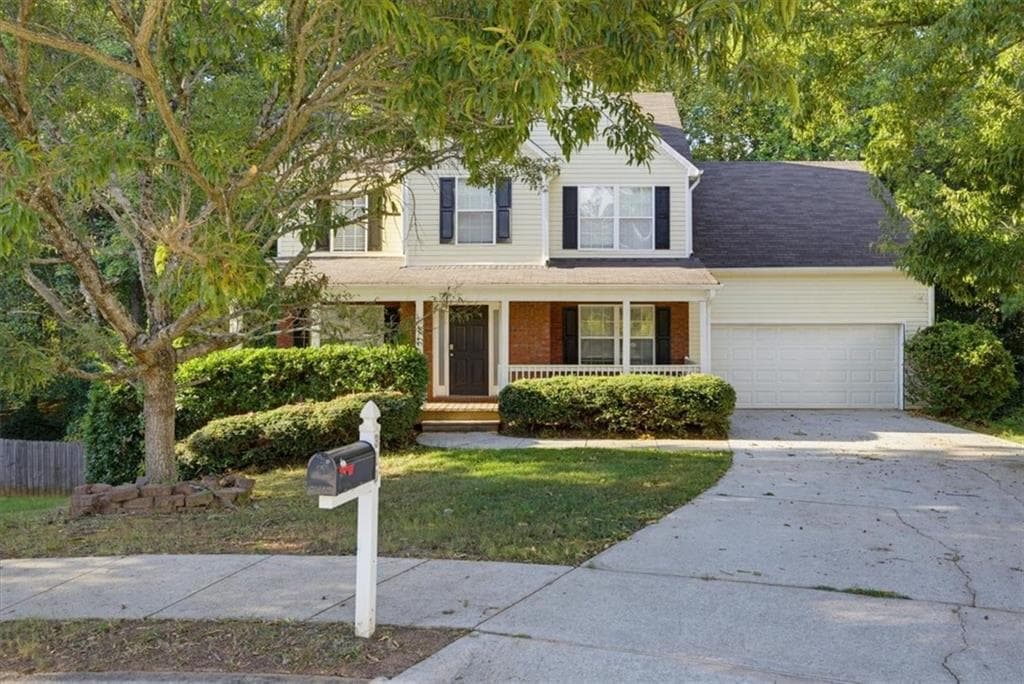 4 bedroom, 3 bathroom, 1,998 sq ft single family residence for sale at 310 Rockingham Drive, Loganville, GA 30052 — photo 2