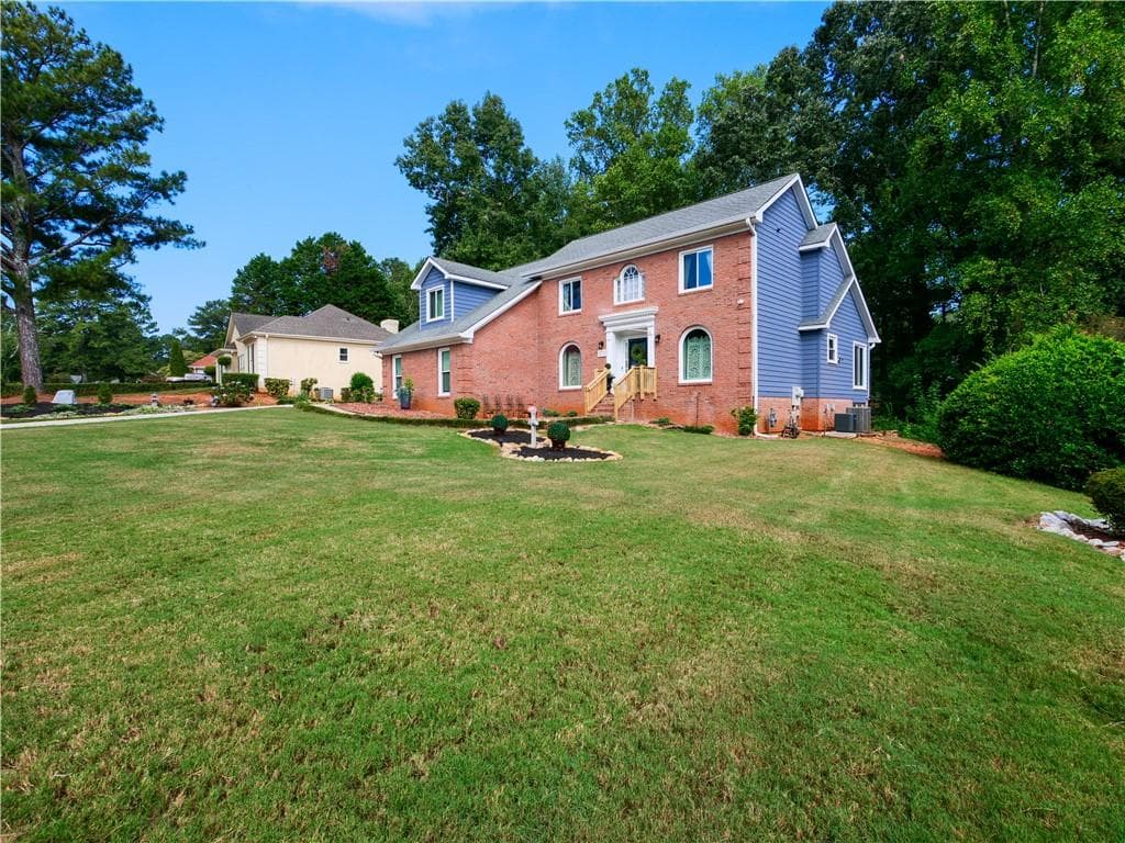 4 bedroom, 3 bathroom, 2,738 sq ft single family residence for sale at 4750 Meadowlark Drive, Conyers, GA 30094 — photo 2