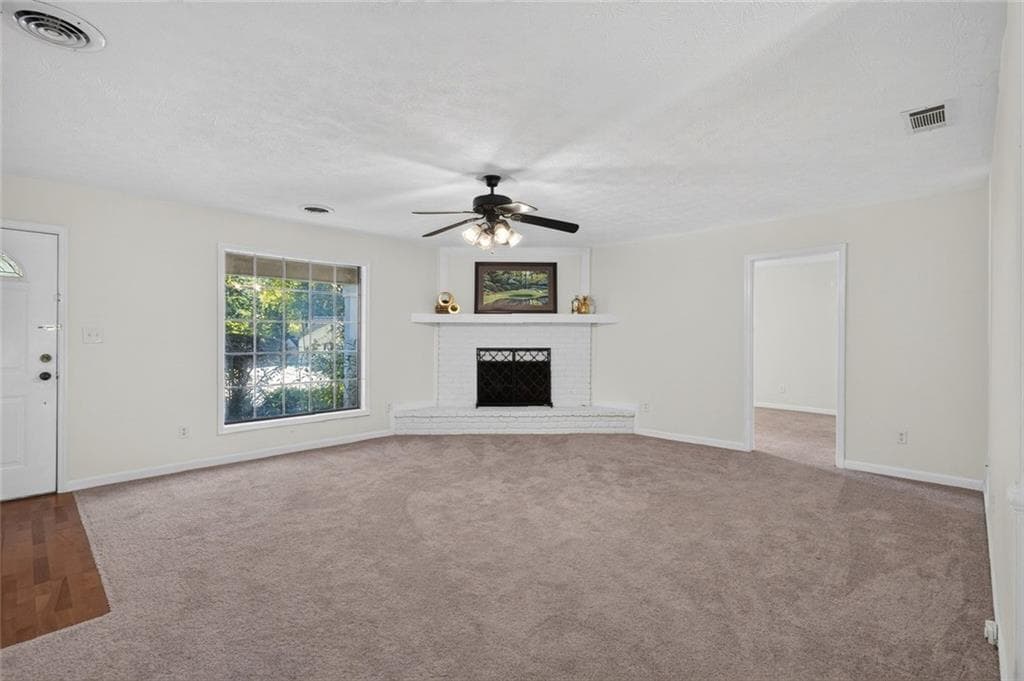4 bedroom, 2 bathroom, 1,680 sq ft single family residence for sale at 850 The Circle, Lawrenceville, GA 30043 — photo 4