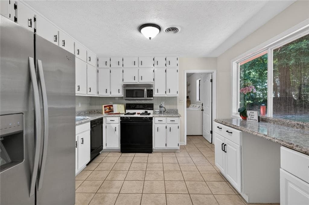 4 bedroom, 2 bathroom, 1,680 sq ft single family residence for sale at 850 The Circle, Lawrenceville, GA 30043 — photo 7
