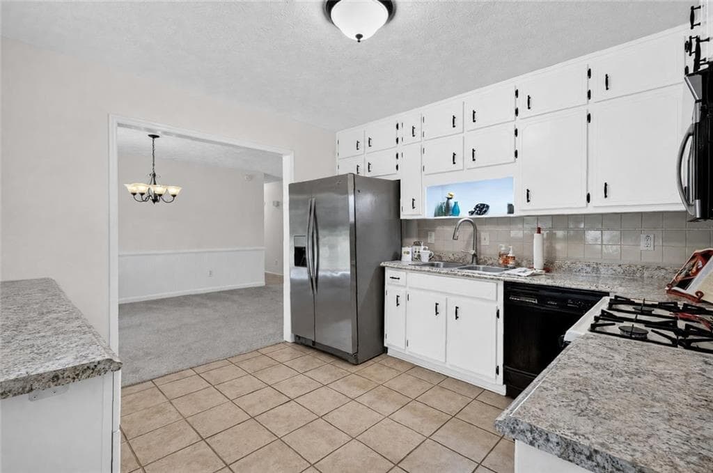 4 bedroom, 2 bathroom, 1,680 sq ft single family residence for sale at 850 The Circle, Lawrenceville, GA 30043 — photo 8