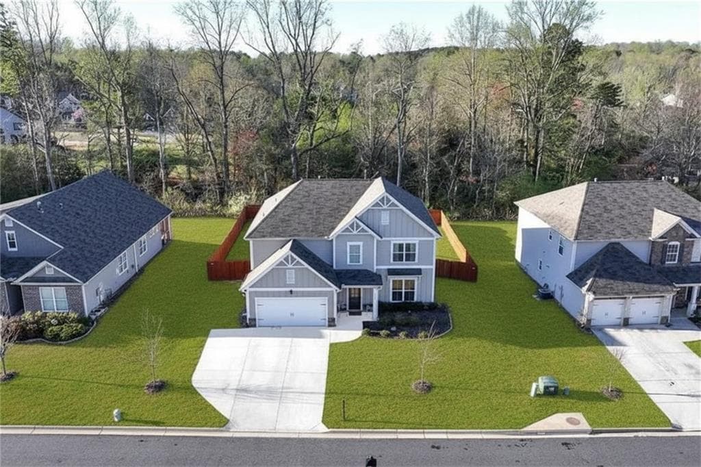 5 bedroom, 3 bathroom, 3,100 sq ft single family residence for sale at 7545 Rambling Vale, Cumming, GA 30028 — photo 4