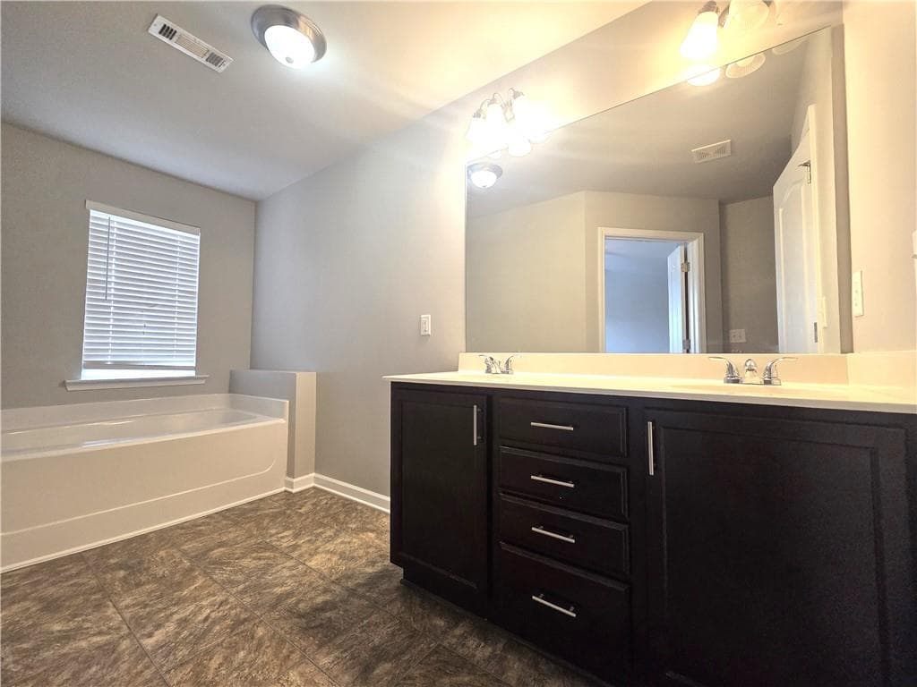 3 bedroom, 3 bathroom, 1,974 sq ft townhouse for rent at 2716 Sardis Chase Court, Buford, GA 30519 for $2,300 a month — photo 9
