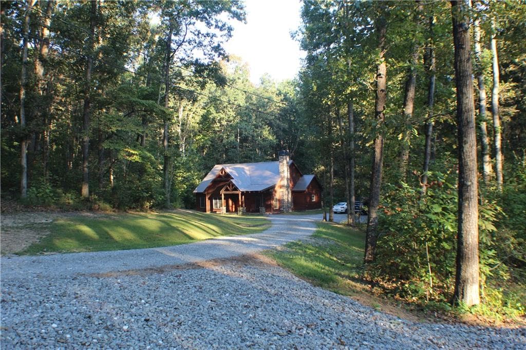 3 bedroom, 2 bathroom, 1,667 sq ft single family residence for sale at 8187 Highway 53 West, Jasper, GA 30143 — photo 2