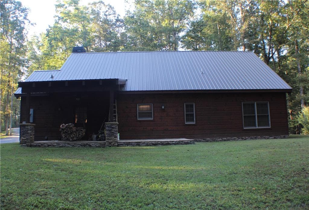 3 bedroom, 2 bathroom, 1,667 sq ft single family residence for sale at 8187 Highway 53 West, Jasper, GA 30143 — photo 4