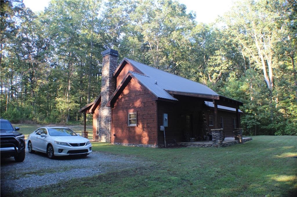 3 bedroom, 2 bathroom, 1,667 sq ft single family residence for sale at 8187 Highway 53 West, Jasper, GA 30143 — photo 5