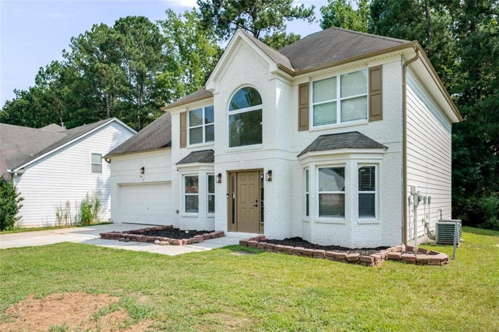 4 bedroom, 3 bathroom, 2,484 sq ft single family residence for sale at 1376 Koble Mill Lane, Riverdale, GA 30296 — photo 2