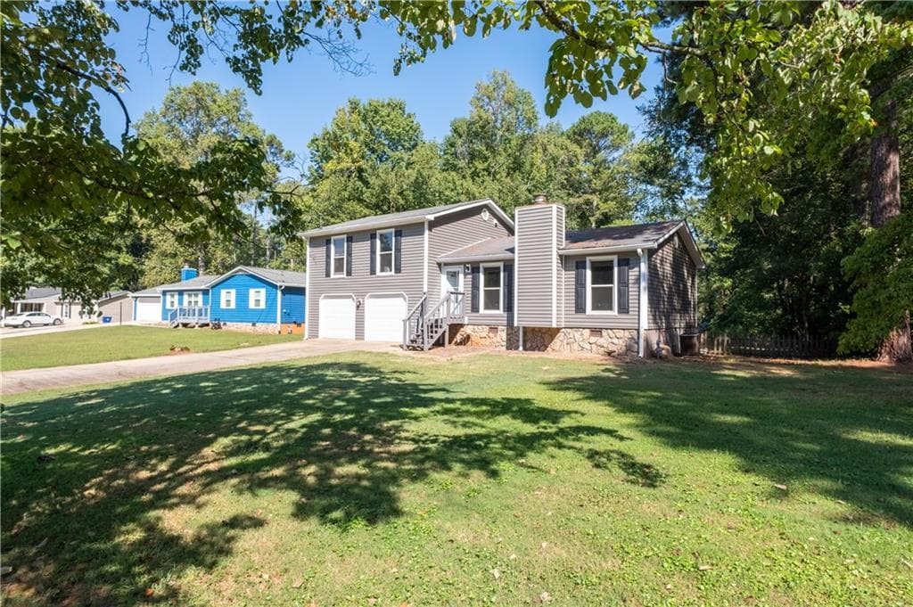 3 bedroom, 2 bathroom, 1,348 sq ft single family residence for sale at 1119 Blazing Ridge, Lawrenceville, GA 30046 — photo 3