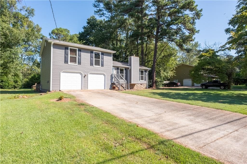 3 bedroom, 2 bathroom, 1,348 sq ft single family residence for sale at 1119 Blazing Ridge, Lawrenceville, GA 30046 — photo 4