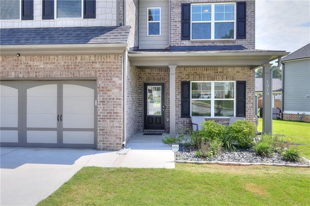 4 bedroom, 4 bathroom, 2,688 sq ft single family residence for sale at 1319 Kim Manor Way, Lawrenceville, GA 30043 — photo 4