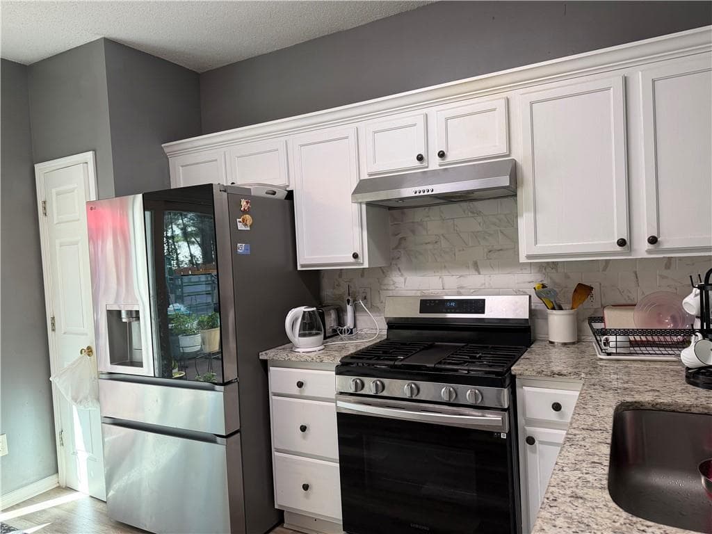 4 bedroom, 3 bathroom, 1,413 sq ft single family residence for rent at 2613 Regent Walk Drive, Duluth, GA 30096 for $2,300 a month — photo 5