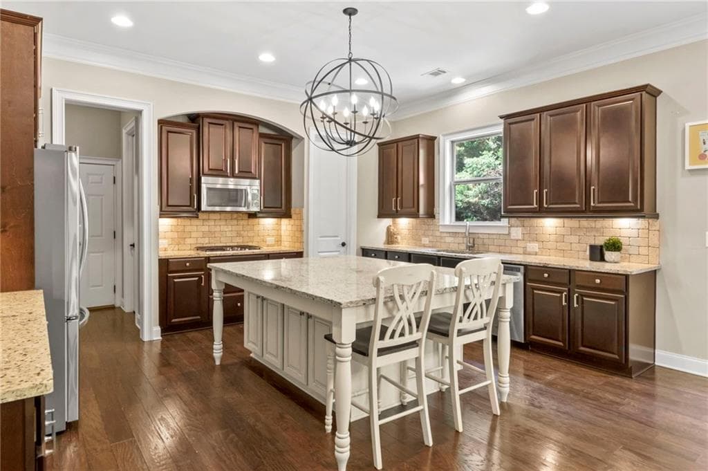 6 bedroom, 5 bathroom, 6,021 sq ft single family residence for sale at 12460 Pindell Circle, Alpharetta, GA 30004 — photo 5