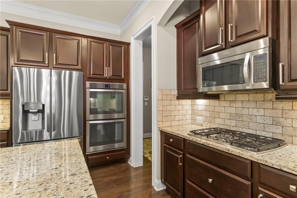 6 bedroom, 5 bathroom, 6,021 sq ft single family residence for sale at 12460 Pindell Circle, Alpharetta, GA 30004 — photo 7