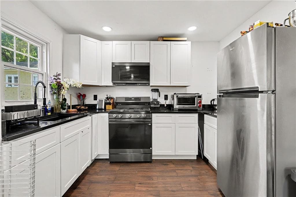 4 bedroom, 2 bathroom, 1,880 sq ft single family residence for sale at 1251 Monroe Drive Northeast, Atlanta, GA 30306 — photo 3