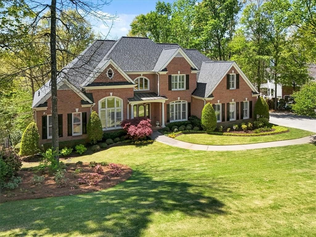 4 bedroom, 6 bathroom, 5,838 sq ft single family residence for sale at 4110 Runnymede Drive, Lilburn, GA 30047 — photo 2