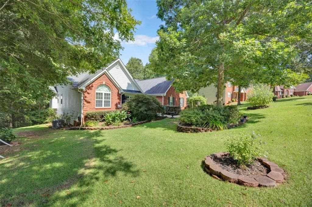 4 bedroom, 3 bathroom, 2,570 sq ft single family residence for sale at 40 Woodcrest Avenue, Covington, GA 30016