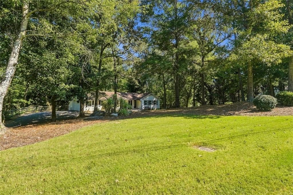 3 bedroom, 2 bathroom, 1,776 sq ft single family residence for sale at 1770 Redd Road, Milton, GA 30004 — photo 2