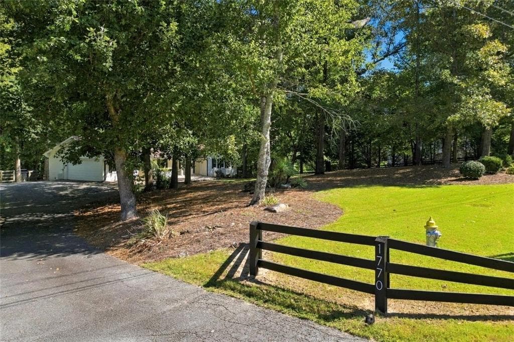 3 bedroom, 2 bathroom, 1,776 sq ft single family residence for sale at 1770 Redd Road, Milton, GA 30004 — photo 4