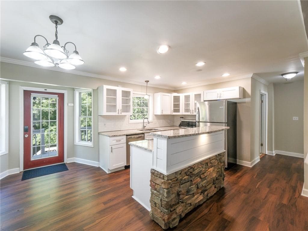 5 bedroom, 4 bathroom, 3,079 sq ft single family residence for sale at 3225 Harris Drive, Atlanta, GA 30344 — photo 3