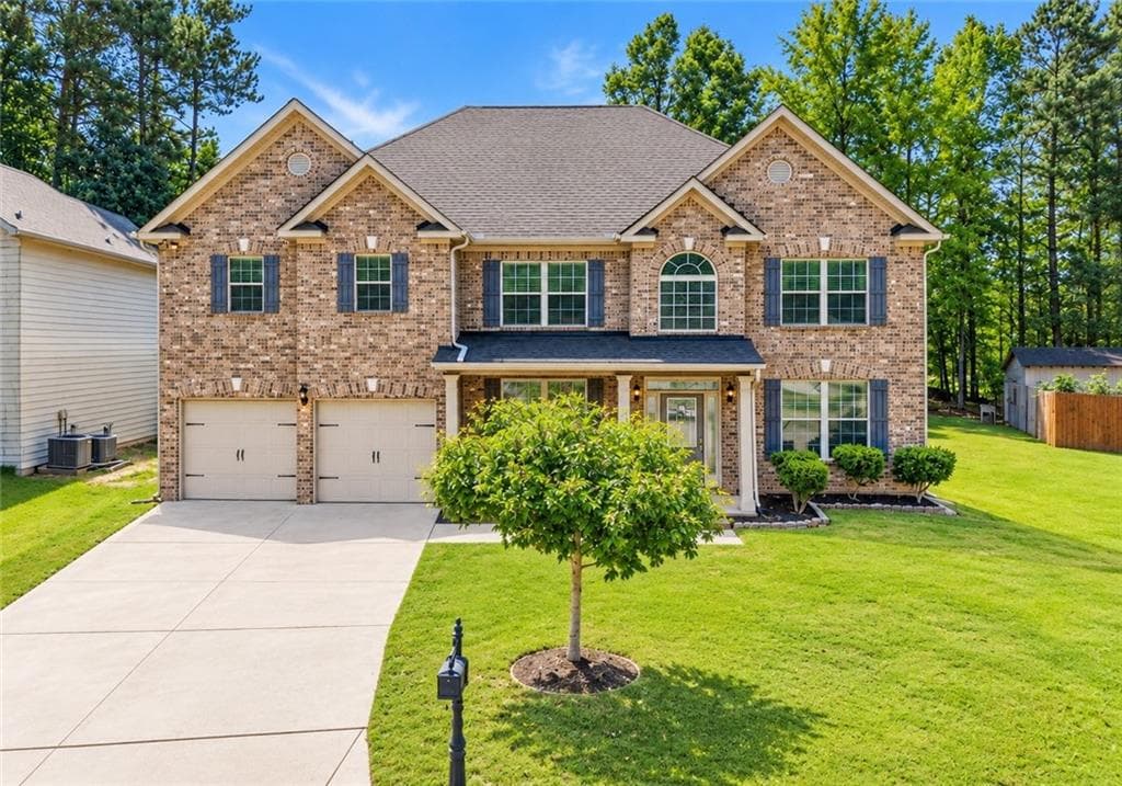 6 bedroom, 5 bathroom, 3,733 sq ft single family residence for sale at 3594 Hideaway Lane, Loganville, GA 30052 — photo 2