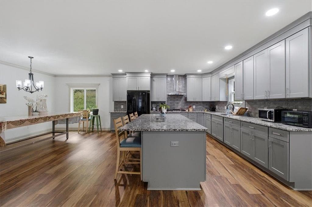 9 bedroom, 6 bathroom, 4,732 sq ft single family residence for sale at 6274 Booker Lane, Lithonia, GA 30058 — photo 8