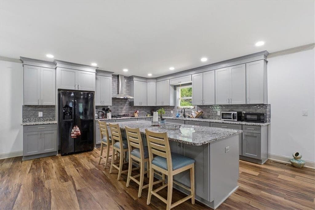 9 bedroom, 6 bathroom, 4,732 sq ft single family residence for sale at 6274 Booker Lane, Lithonia, GA 30058 — photo 9