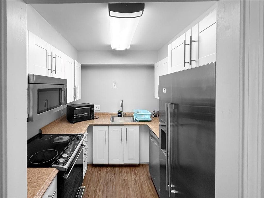 2 bedroom, 2 bathroom, 1,012 sq ft condominium for sale at 475 Mount Vernon Highway A100, Sandy Springs, GA 30328 — photo 3