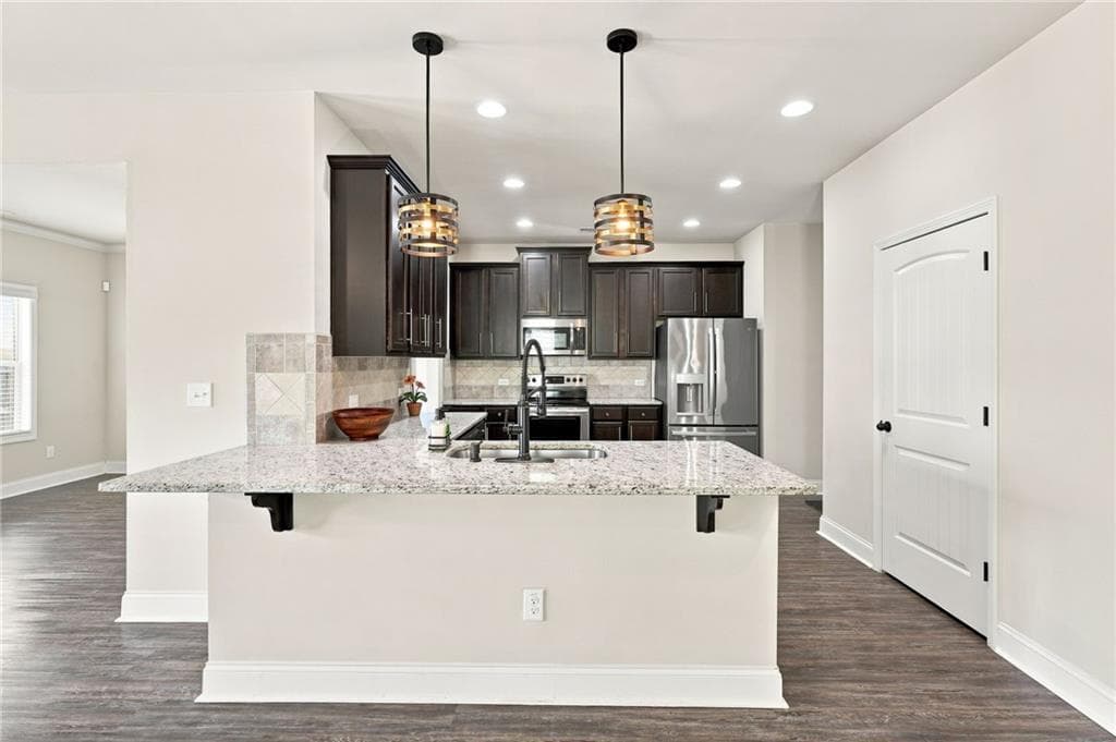 4 bedroom, 3 bathroom, 2,415 sq ft single family residence for sale at 8011 Orange Grove Court Court, Locust Grove, GA 30248 — photo 2