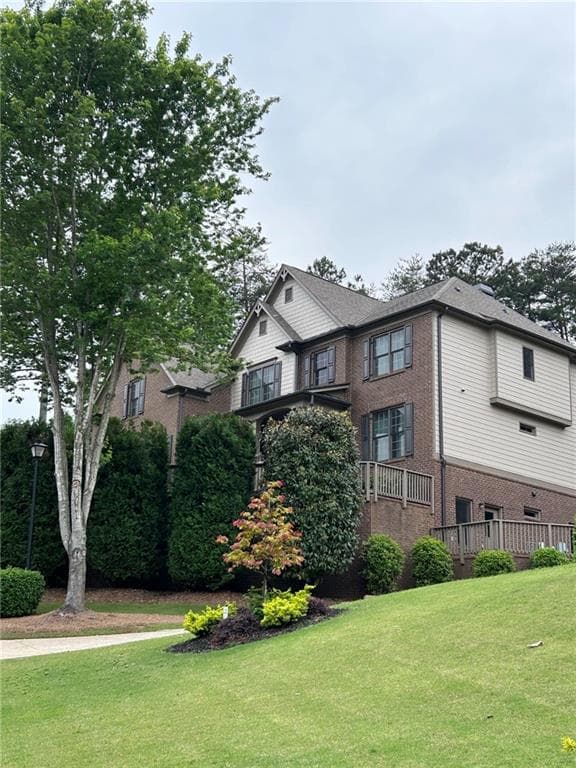 6 bedroom, 5 bathroom, 4,467 sq ft single family residence for sale at 6040 Windjammer Point, Cumming, GA 30041 — photo 2