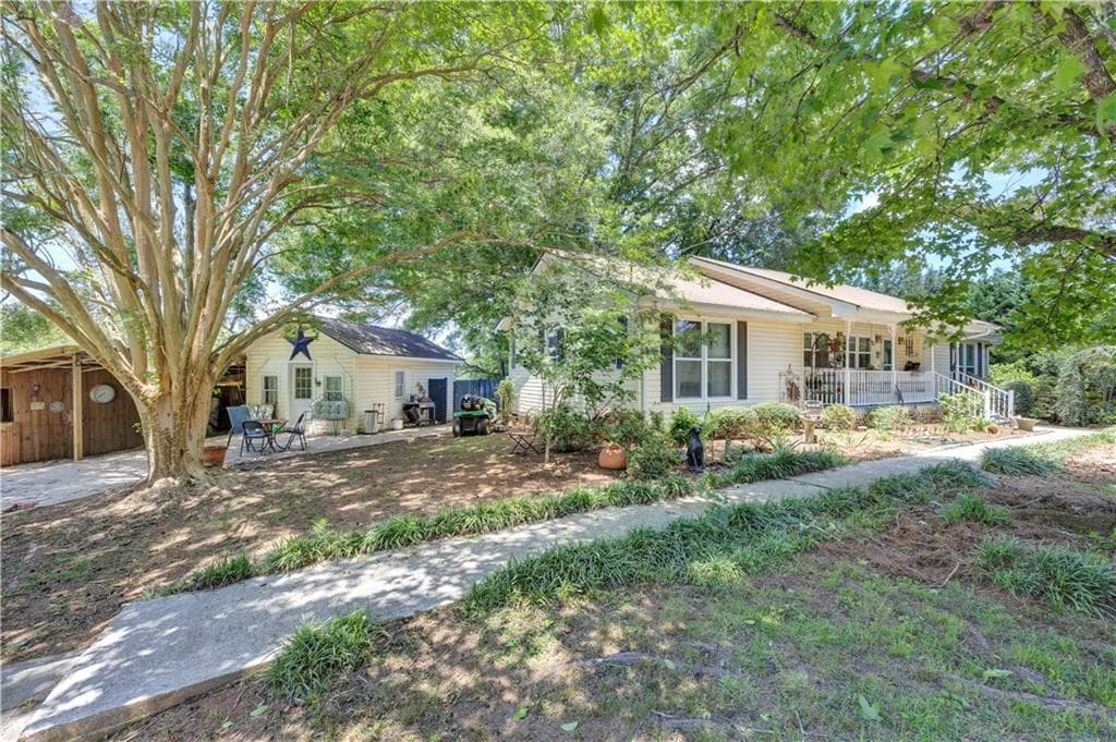 2 bedroom, 2 bathroom, 1,542 sq ft single family residence for sale at 4133 H D Atha Road, Covington, GA 30014 — photo 1 of 37