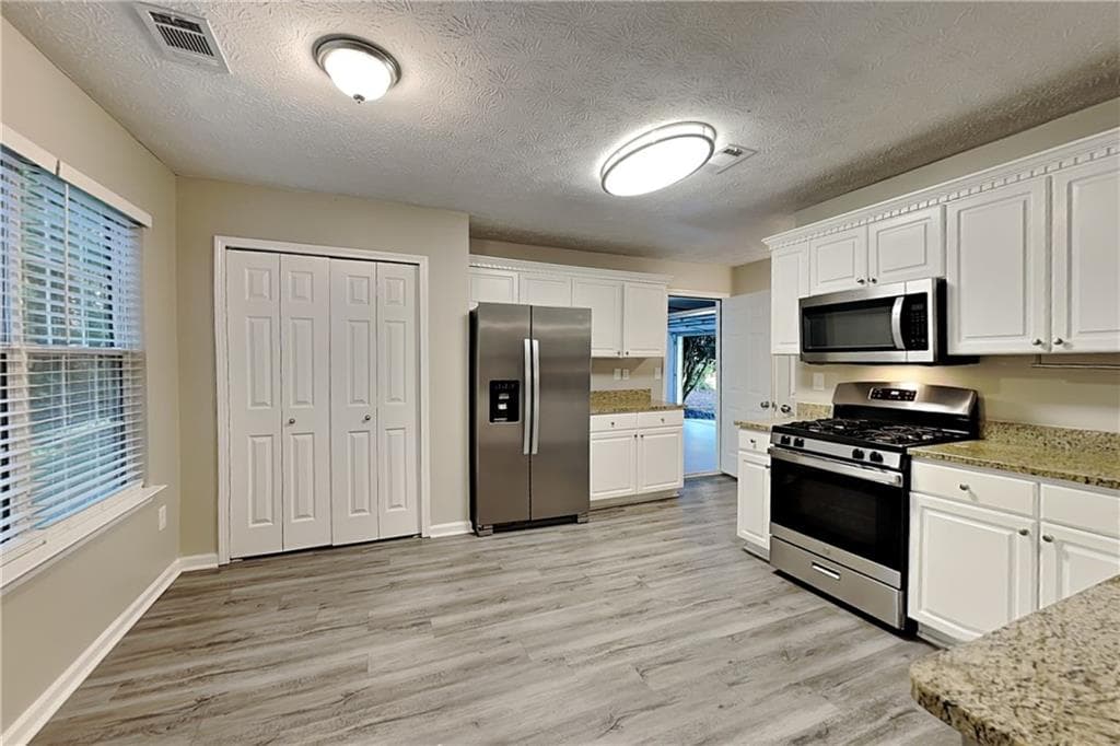 4 bedroom, 3 bathroom, 2,241 sq ft single family residence for rent at 1357 Lamont Drive, Mableton, GA 30126 for $2,300 a month — photo 4