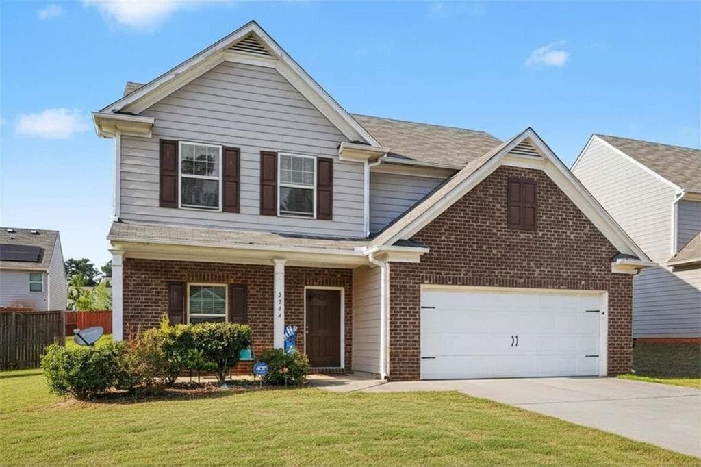 4 bedroom, 3 bathroom, 1,910 sq ft single family residence for sale at 2344 Clapton Court, Jonesboro, GA 30236 — photo 2