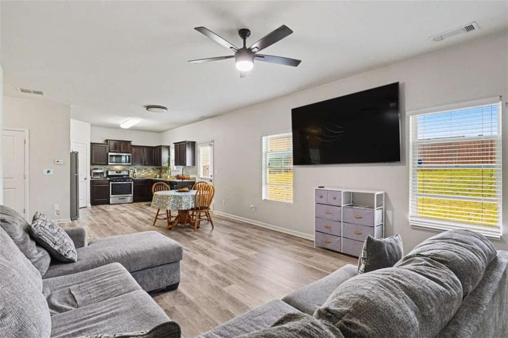 4 bedroom, 3 bathroom, 1,910 sq ft single family residence for sale at 2344 Clapton Court, Jonesboro, GA 30236 — photo 4