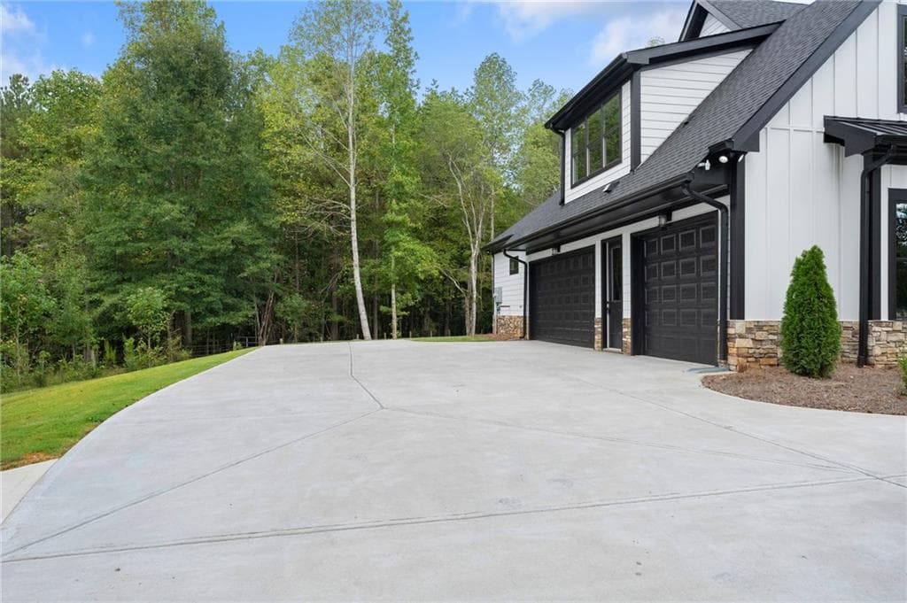 5 bedroom, 6 bathroom, 3,936 sq ft single family residence for sale at 5697 Ball Ground Road, Ball Ground, GA 30107 — photo 5