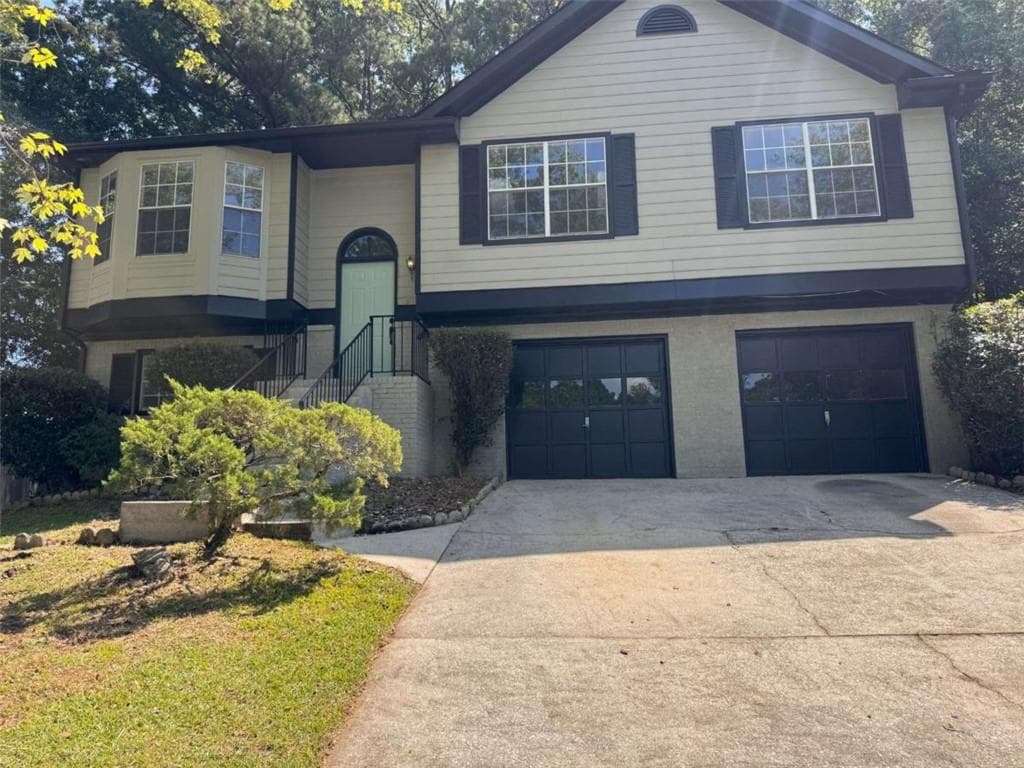 4 bedroom, 3 bathroom, 1,257 sq ft single family residence for sale at 2218 Cody Court, Lithonia, GA 30058 — photo 2
